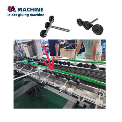 Macchine di incollaggio automatiche di grado automatico per piegare e incollare ricambi per scatole